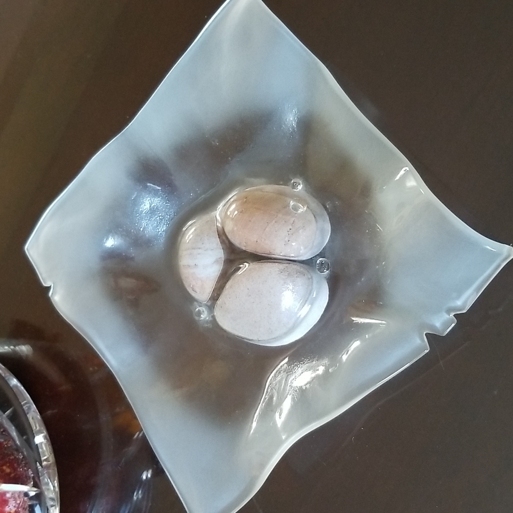 Doetsch molton glass on beach stones art